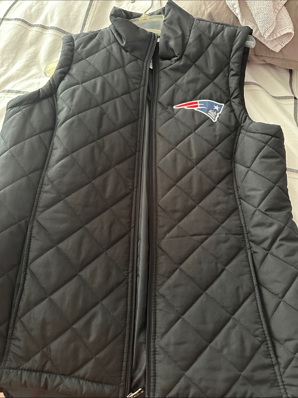 NFL Women's Black Quilted Vest with Team Patch